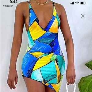 Flinstone like dress in blue and green